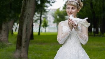 Svatební šaty s rukávy